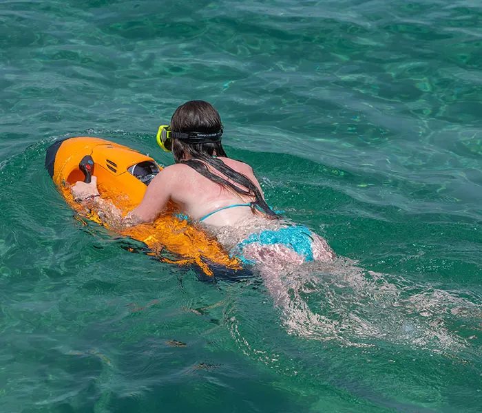 Fleet of colorful Seabobs available to rent at Seven Seas Beach, Fajardo