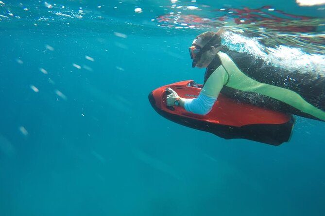 Premium electric Seabob water scooter floating at Seven Seas Beach
