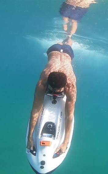 Underwater Seabob diving through turquoise water in Fajardo